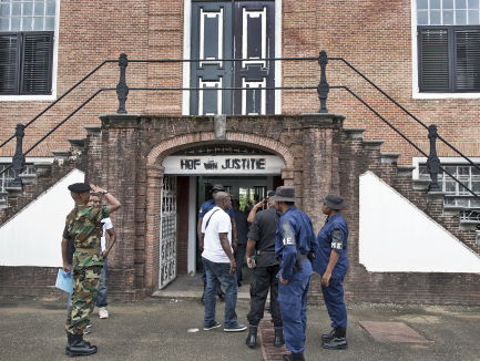 Het Decembermoorden-proces gaat door