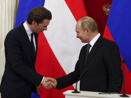 Warm Oostenrijks ontvangst voor Poetin