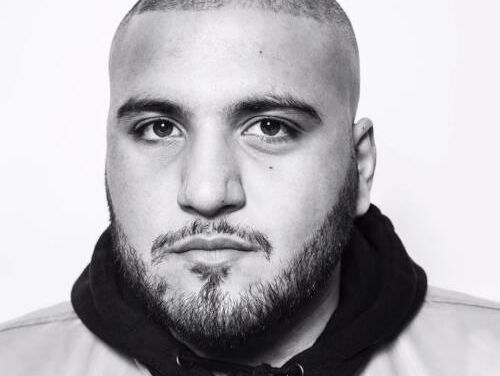 Druktemaker Massih Hutak - Klederdracht in Nederland