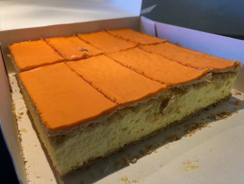 De roots van de oranje tompouce