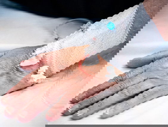 Met een zwabber versus het virus