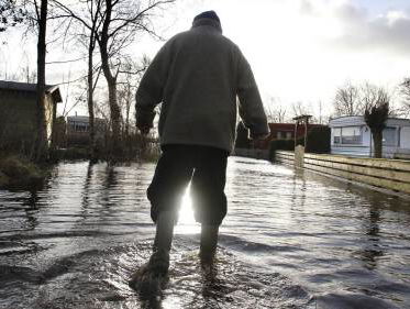 Burgers met natte voeten wijzen vooral naar de overheid