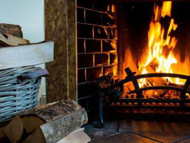 'Overheid moet gebruik haarden en kachels ontmoedigen'