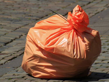 Fietsende vuilnisman