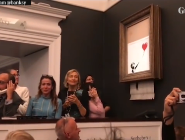 BANKSY-KUNSTWERK VERSNIPPERT ZICHZELF. Is dit een publiciteitsstunt?