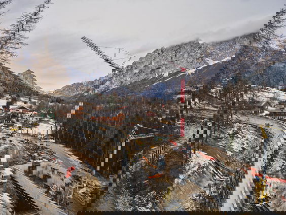 Italiaans duurzame Spelen: bobsleeën door eeuwenoud bos en een skilift in de achtertuin