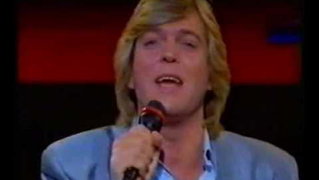 Scott Fitzgerald kreeg 1 punt minder dan Céline Dion op het Eurovisiesongfe ...