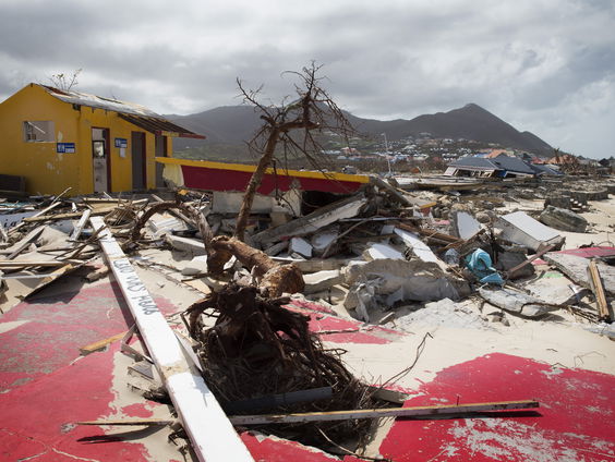 Wat is het belang van de waarschuwing van de Centrale Bank voor de economie in 't Caribisch gebied?