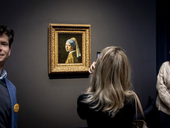 Geen straf voor klimaatactivisten die Meisje met de parel beschadigden: terecht of onrechtvaardig?