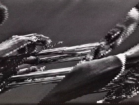 Een bescheiden fotograaf met een schatkist aan foto's