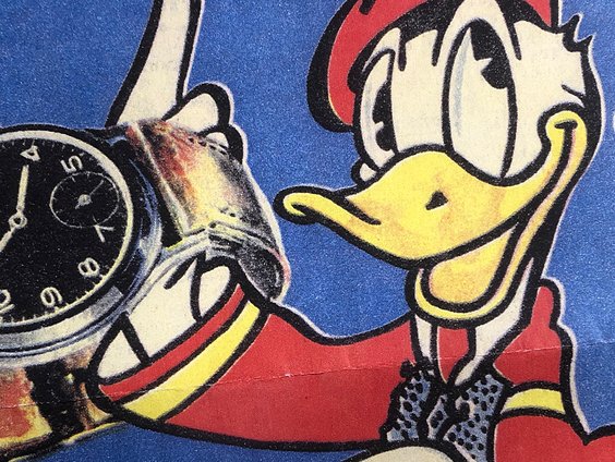 Alex zoekt een horloge uit de Donald Duck. Wie heeft er een exemplaar?